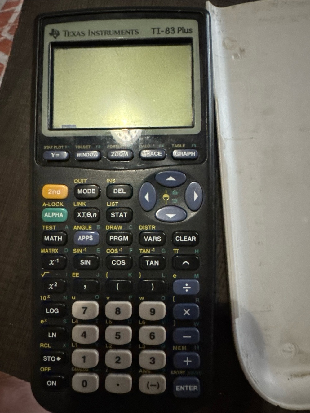 Texas Instruments TI-83 Plus Graphing Calculator - Black with White Keys works